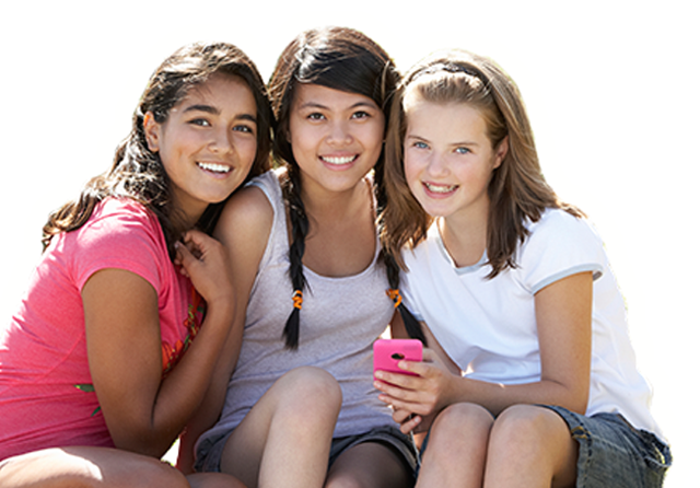 Three friends sitting together and smiling.